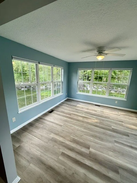 Remodeled living room with luxury vinyl plank flooring