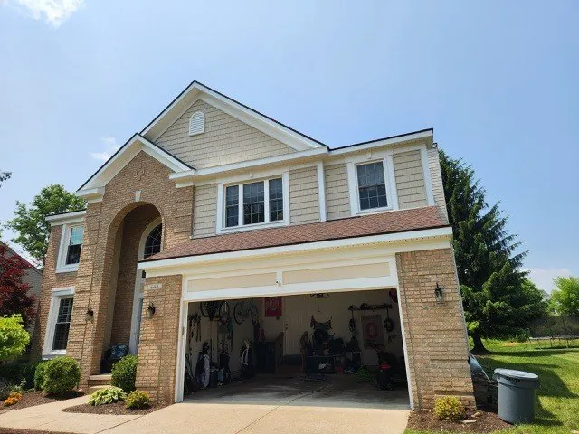 Home exterior siding with stone accents